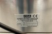 Semi-automatic labelling machine