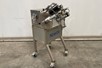 Semi-automatic labelling machine