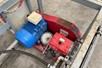 Pump unit for roll container conveyors